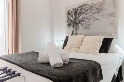 Cama o camas de una habitación en Apartamentos Recaredo 7 , 2ª planta