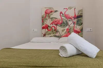 Cama o camas de una habitación en Apartamentos Recaredo 7, Áticos con terraza
