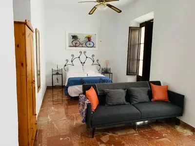 Zona de estar de Apartamentos La Casa del Azafrán