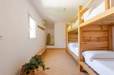 Cama o camas de una habitación en Escaladores Caminito del Rey familia amigos paisaje de ensueño