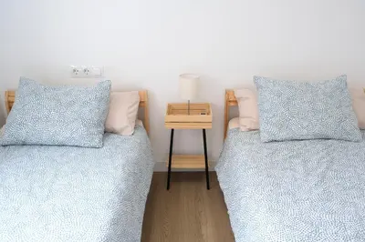 Cama o camas de una habitación en AOVE Suite