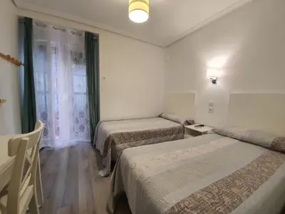 Cama o camas de una habitación en Pensión Martín