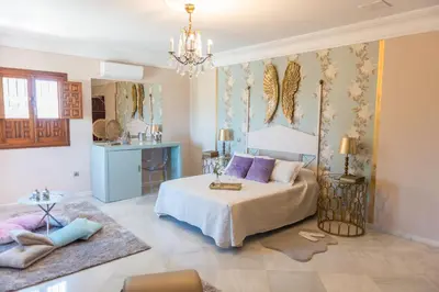 Cama o camas de una habitación en FINCA DOS FUENTES