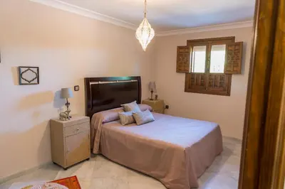 Cama o camas de una habitación en FINCA DOS FUENTES