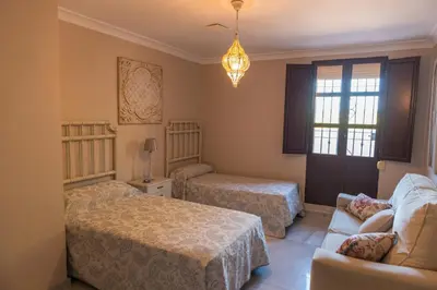 Cama o camas de una habitación en FINCA DOS FUENTES