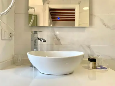 Un baño de La Despensa de la Corredera Hostal