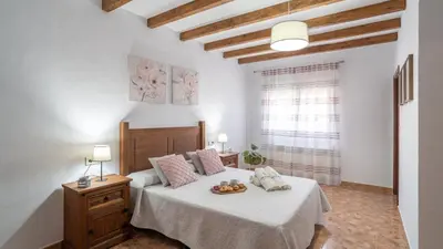 Cama o camas de una habitación en Casa La Sombra de la Parra Antequera - La Higuera by Ruralidays