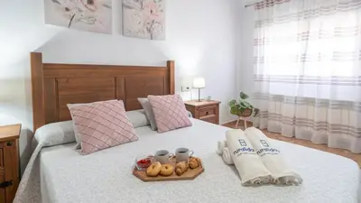Cama o camas de una habitación en Casa La Sombra de la Parra Antequera - La Higuera by Ruralidays