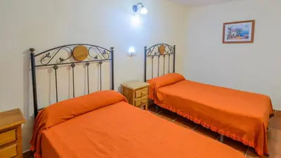 Cama o camas de una habitación en La Casita Montefrio by Ruralidays