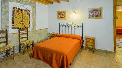 Cama o camas de una habitación en La Casita Montefrio by Ruralidays
