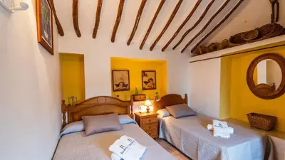 Cama o camas de una habitación en Casa La Canada Villanueva de Algaidas by Ruralidays