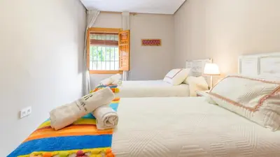 Cama o camas de una habitación en Torreón de Morayma Baena by Ruralidays