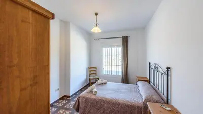 Cama o camas de una habitación en Casa La Molina Riogordo by Ruralidays