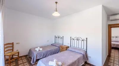 Cama o camas de una habitación en Casa La Molina Riogordo by Ruralidays