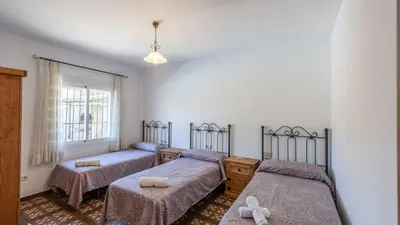 Cama o camas de una habitación en Casa La Molina Riogordo by Ruralidays