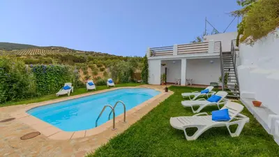 Piscina en o cerca de Casa Dehesa de las Casas Algarinejo by Ruralidays