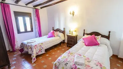 Cama o camas de una habitación en Casa Carmela Priego de Cordoba by Ruralidays
