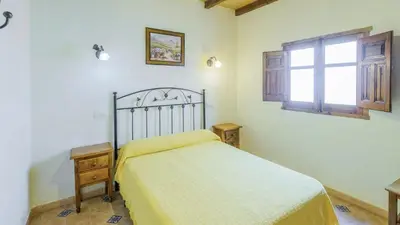 Cama o camas de una habitación en Villa el Establo Montefrio by Ruralidays