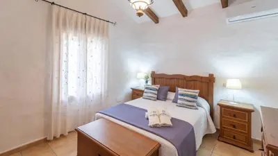 Cama o camas de una habitación en Finca del Rio Antequera - La Higuera by Ruralidays