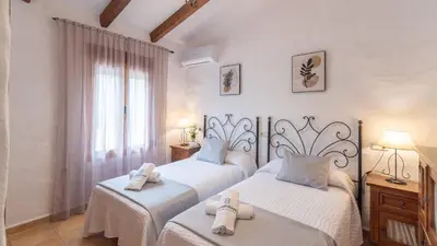 Cama o camas de una habitación en Finca del Rio Antequera - La Higuera by Ruralidays