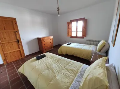 Cama o camas de una habitación en Casa Rural Huerta Abuela María