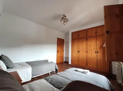 Cama o camas de una habitación en Casa Rural Huerta Abuela María