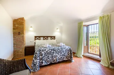 Cama o camas de una habitación en Casas rurales 