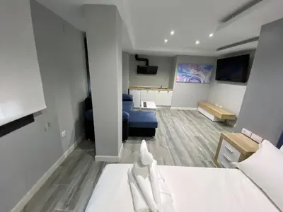 Cama o camas de una habitación en Apartamentos Las 7 Esencias