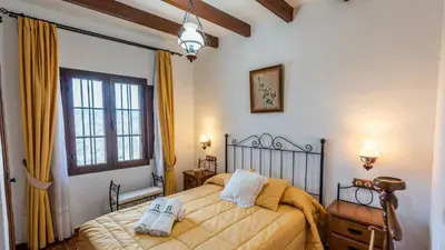 Cama o camas de una habitación en Casa La Encina Alora by Ruralidays