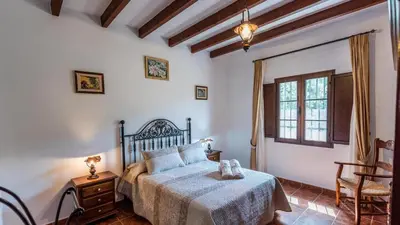 Cama o camas de una habitación en Casa La Encina Alora by Ruralidays