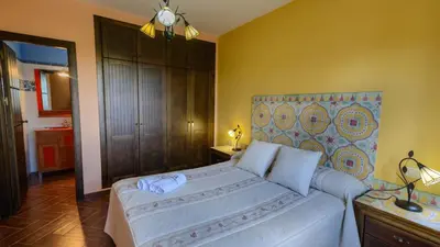 Cama o camas de una habitación en Casa Las Lomas de San Rafael Periana by Ruralidays