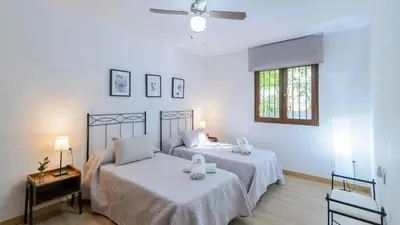 Cama o camas de una habitación en Villa El Molinillo Casabermeja by Ruralidays