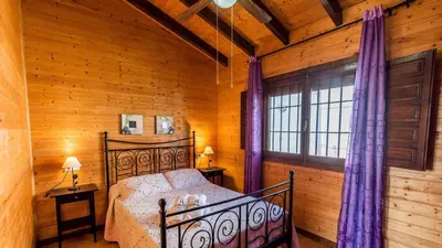Cama o camas de una habitación en Casita de Madera Ardales by Ruralidays