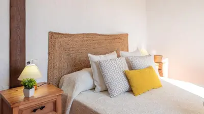 Cama o camas de una habitación en La Era Cortijo Completo Villanueva del Trabuco by Ruralidays