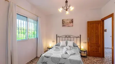 Cama o camas de una habitación en Casa Alejo Antequera - La Higuera by Ruralidays