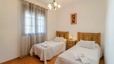 Cama o camas de una habitación en Casa El Mirador Iznajar by Ruralidays