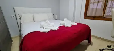 Cama o camas de una habitación en Casa Puerta de la Victoria
