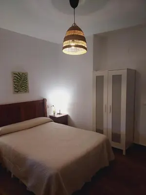 Cama o camas de una habitación en LOS NOGALES