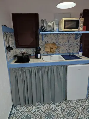 Una cocina o zona de cocina en El Escondite de Martina, Áticos Románticos