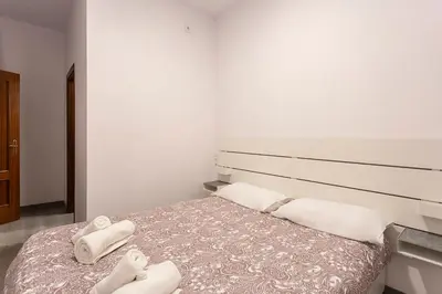 Cama o camas de una habitación en Alameda Urban Apartment