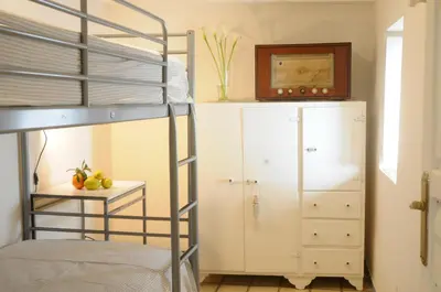 Cama o camas de una habitación en CASA LEÓN BLANCO CARMONA reformada céntrica con chimenea y terraza con vistas