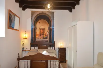 Cama o camas de una habitación en ALCAZAR VIEJO PARKING Tourist Córdoba