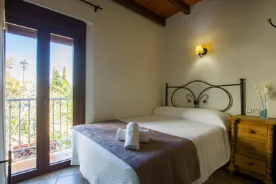 Cama o camas de una habitación en Hostal Valle Del Sol Alora