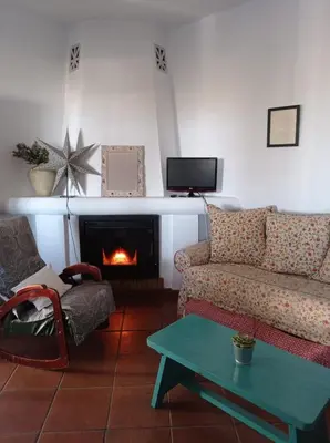 Una televisión o centro de entretenimiento en Casa rural La Vega