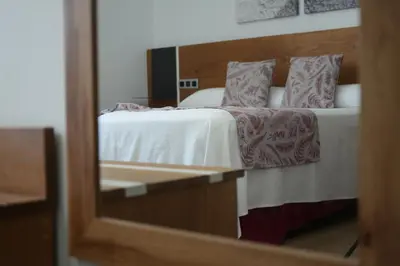 Cama o camas de una habitación en HOTEL DON RAMIRO