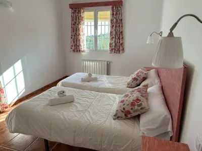 Cama o camas de una habitación en CORTIJO RURAL FLOR DE CAZALLA