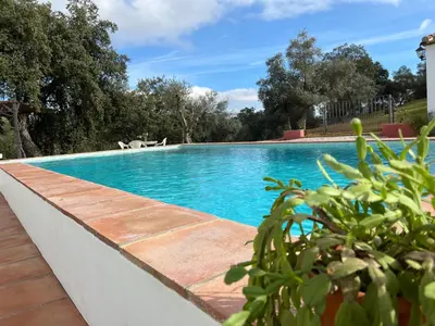 Piscina en o cerca de CORTIJO RURAL FLOR DE CAZALLA