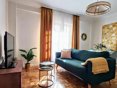Una televisión o centro de entretenimiento en Misterhost Santa Cruz II -Jardines de Murillo