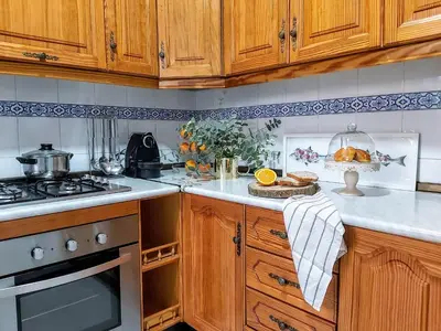 Una cocina o zona de cocina en Misterhost Santa Cruz II -Jardines de Murillo