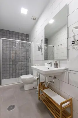 Un baño de Nine O Clock San Agustin Suites